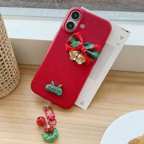 Funda híbrida TPU y PC iPhone 16 diseño campanas navideñas (Roja)