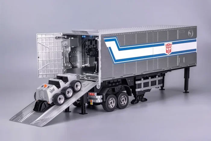 Transformers robot interactivo auto-transformable optimus prime flagship trailer kit 91 cm